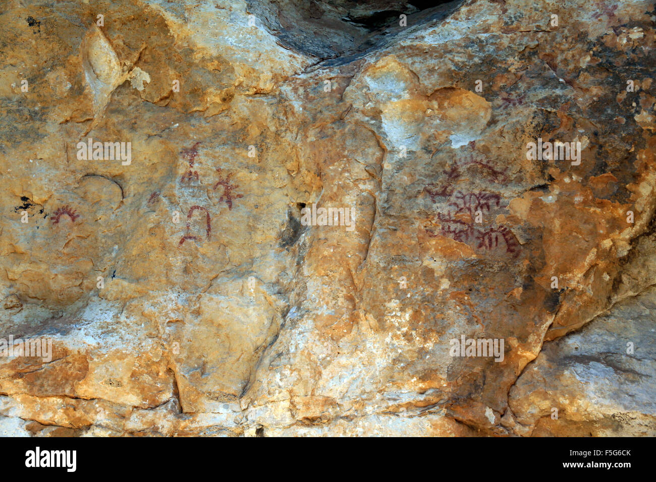 Prehistoric paintings in the cave Portell de les Lletres, near Montblanc, Tarragona, Catalonia, Spain. UNESCO World heritage sit Stock Photo