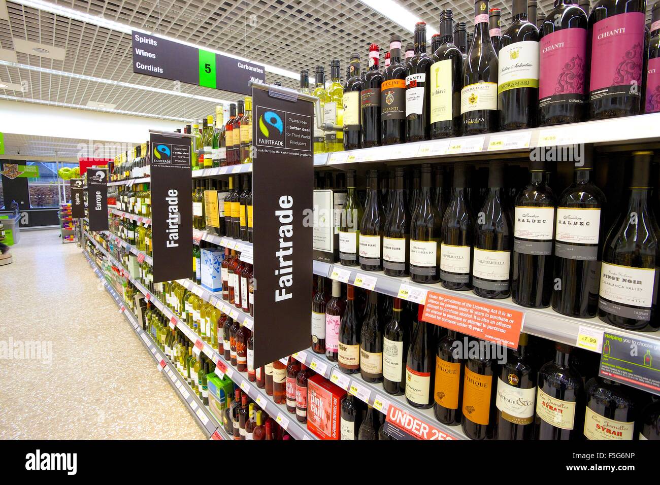 Supermarket fairtrade wine aisle. Stock Photo