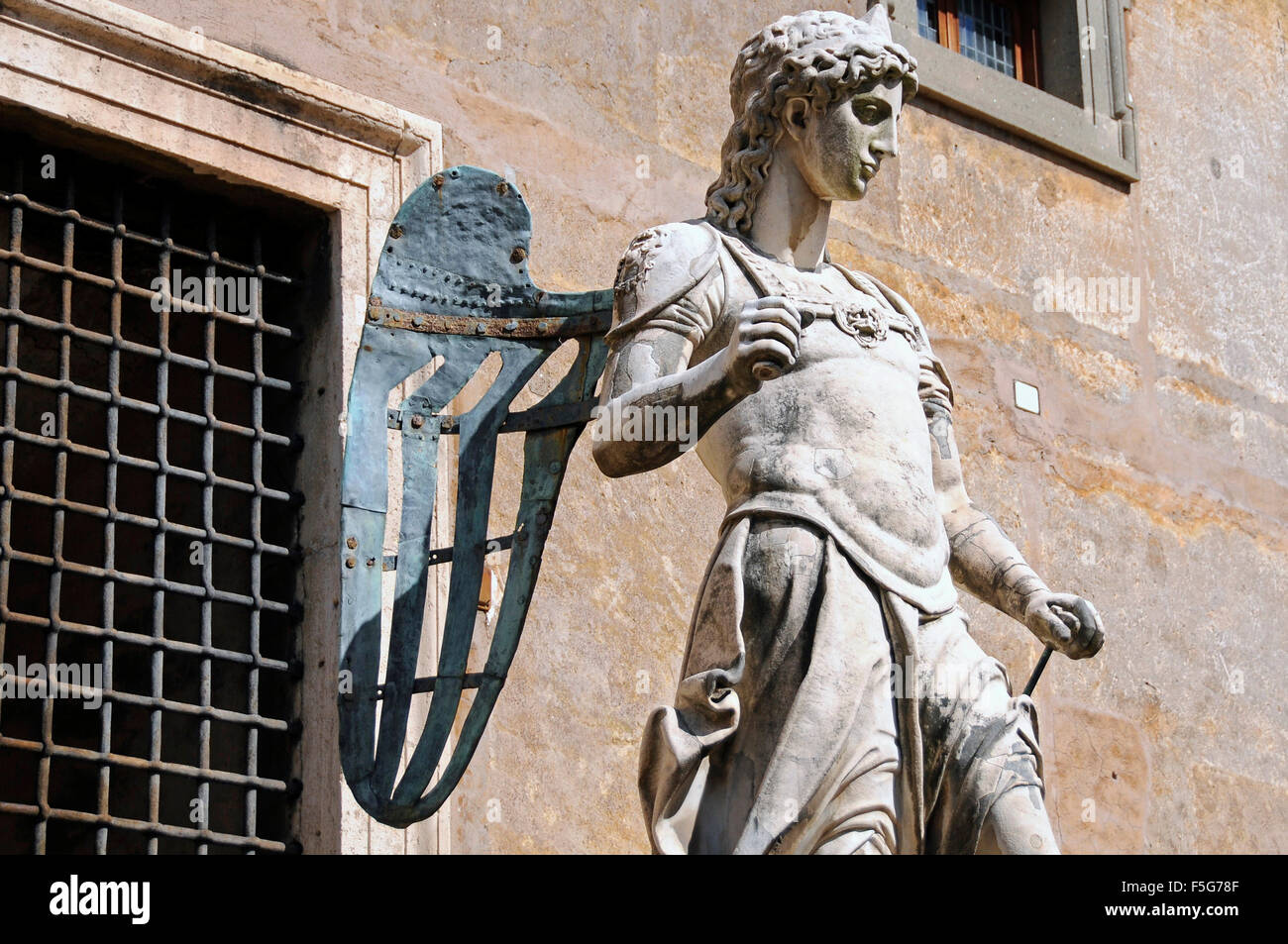 A statue of the Archangel Angel Saint Michael with metal wings at Castle Saint Angelo Rome, Italy Stock Photo