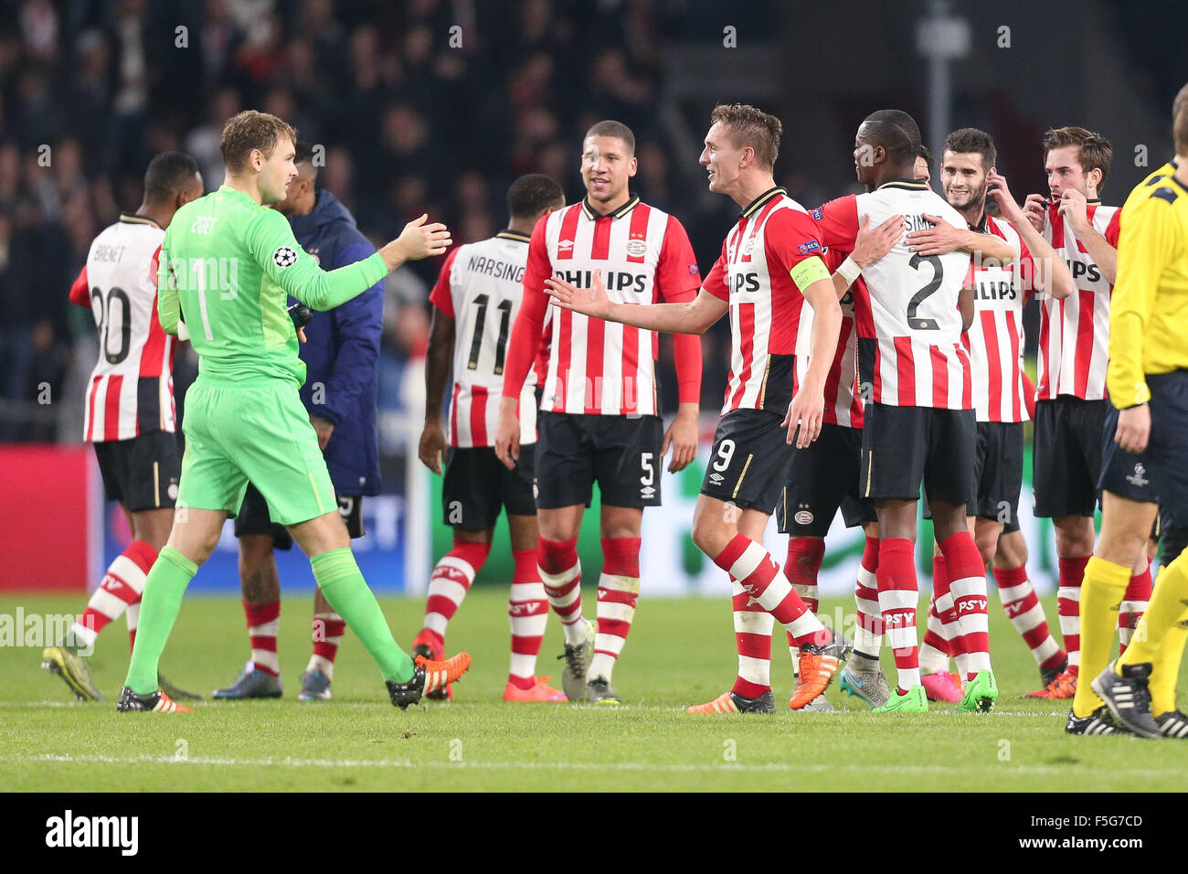 Eindhoven, The Netherlands. 03rd Nov, 2015. Eindhoven players celebrate after the UEFA Champions League Group B soccer match between PSV Eindhoven and VfL Wolfsburg at the PSV Stadium in Eindhoven, The Netherlands, 03 November 2015. Photo: Maja Hitij/dpa/Alamy Live News Stock Photo