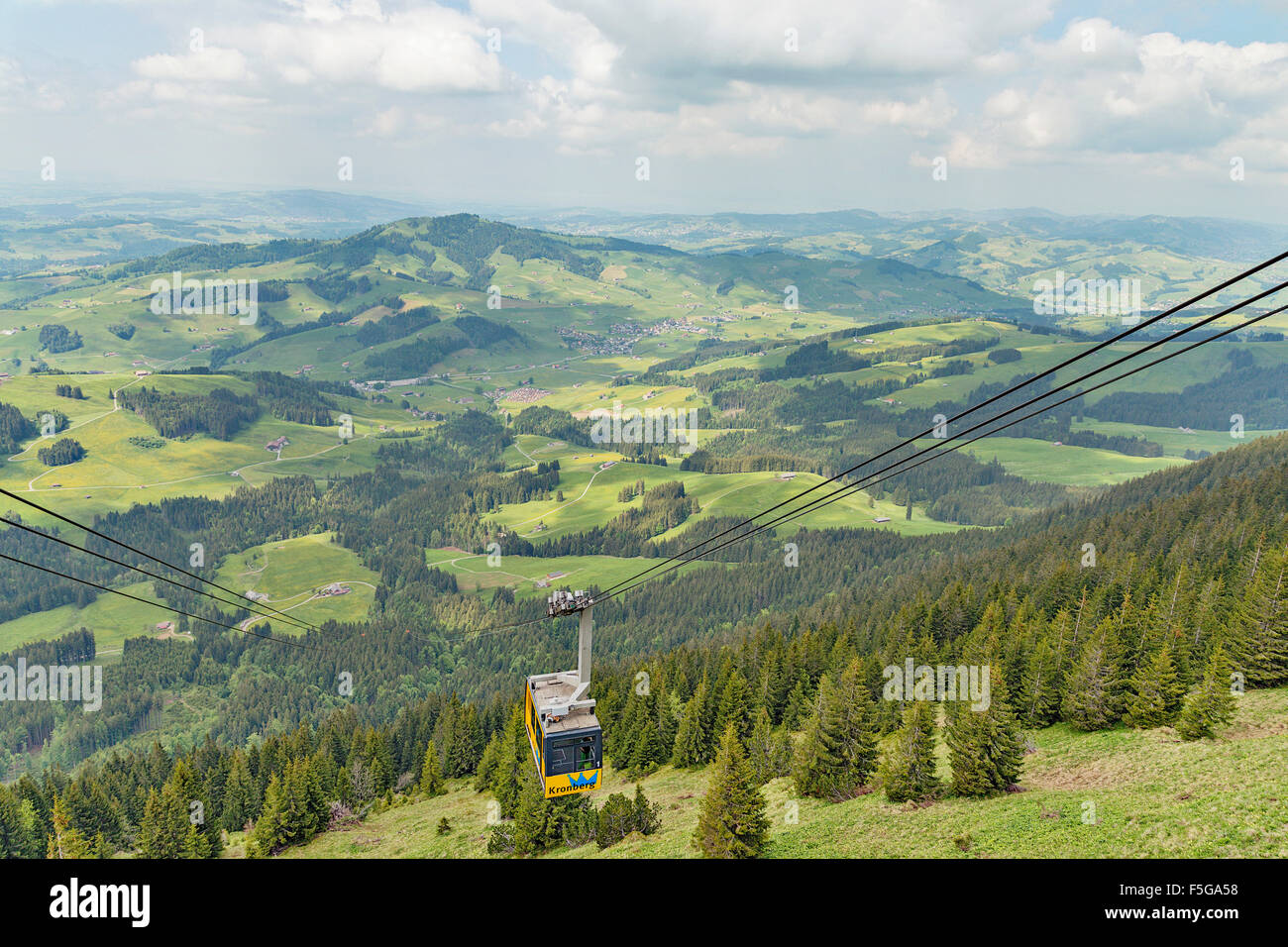 Cable car going to the top of the mountain Kronberg. Appenzell, Switzerland. Stock Photo