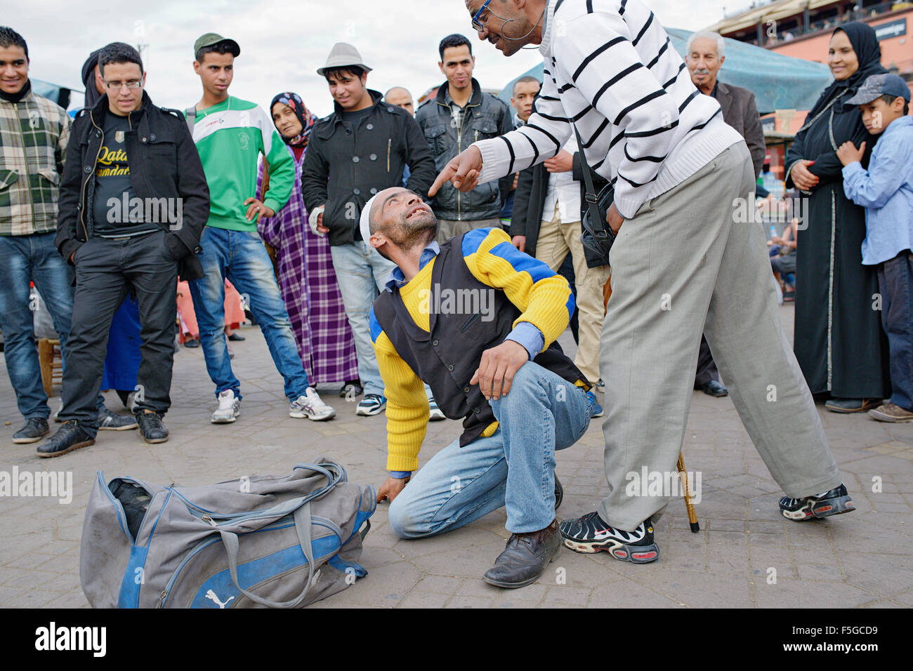 Street comedians at Djemaa el-Fna square, Marrakesh, Morocco. Stock Photo