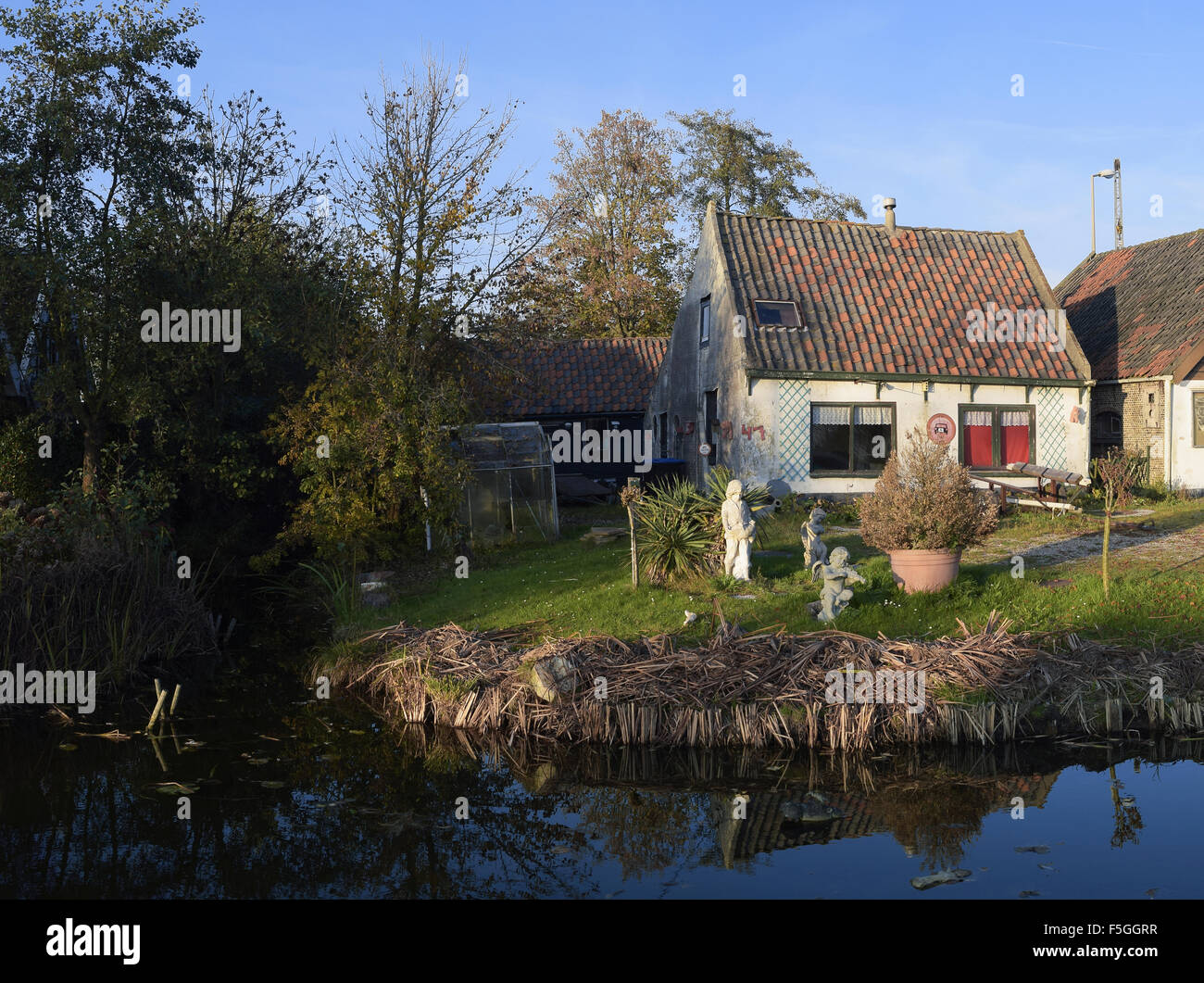 Old cottage situated in The Netherlands. Stock Photo
