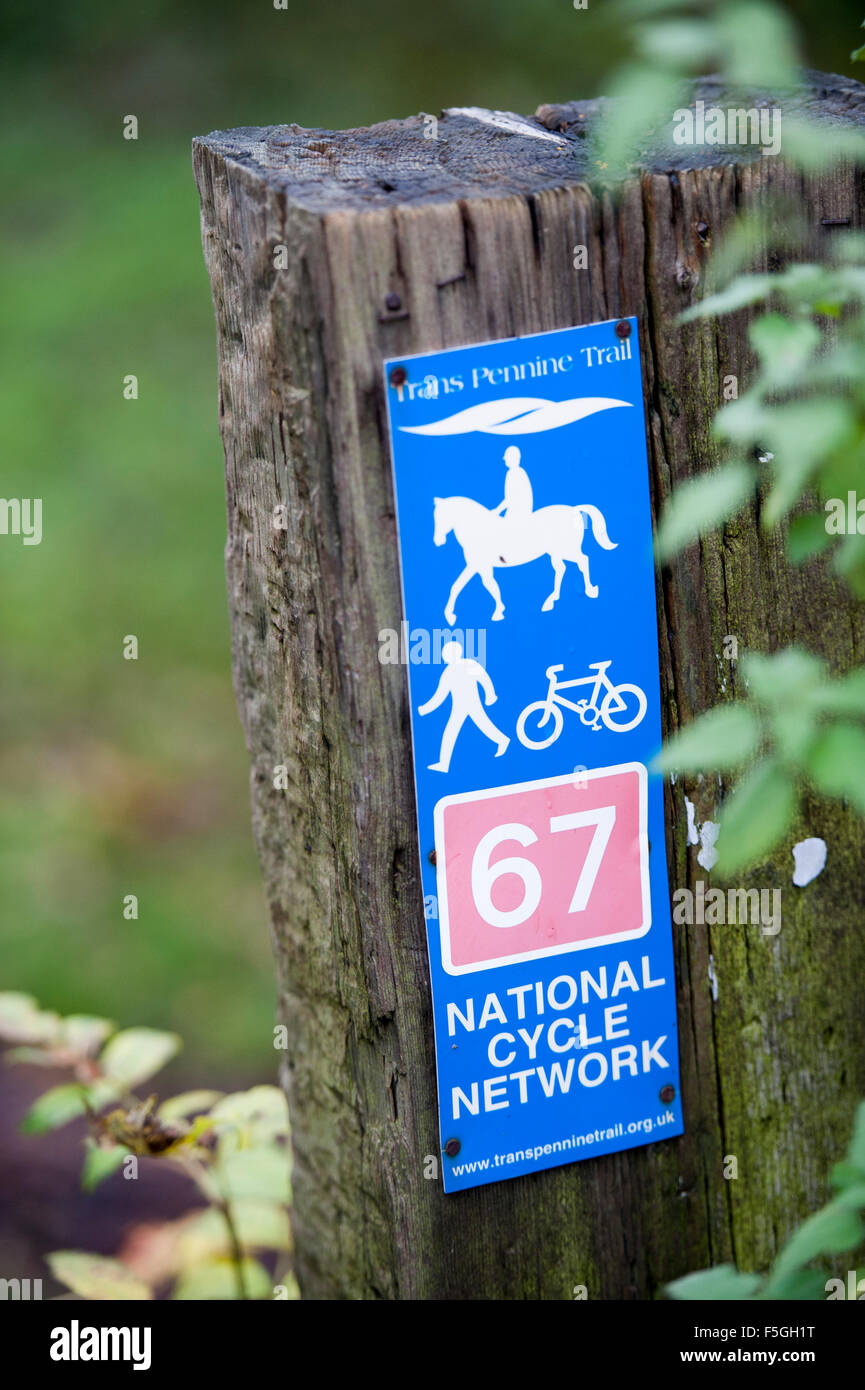 Sign post marking the route of the Trans Pennine Trail in Sheffield, South Yorkshire, part of the Sustrans network for cyclists Stock Photo