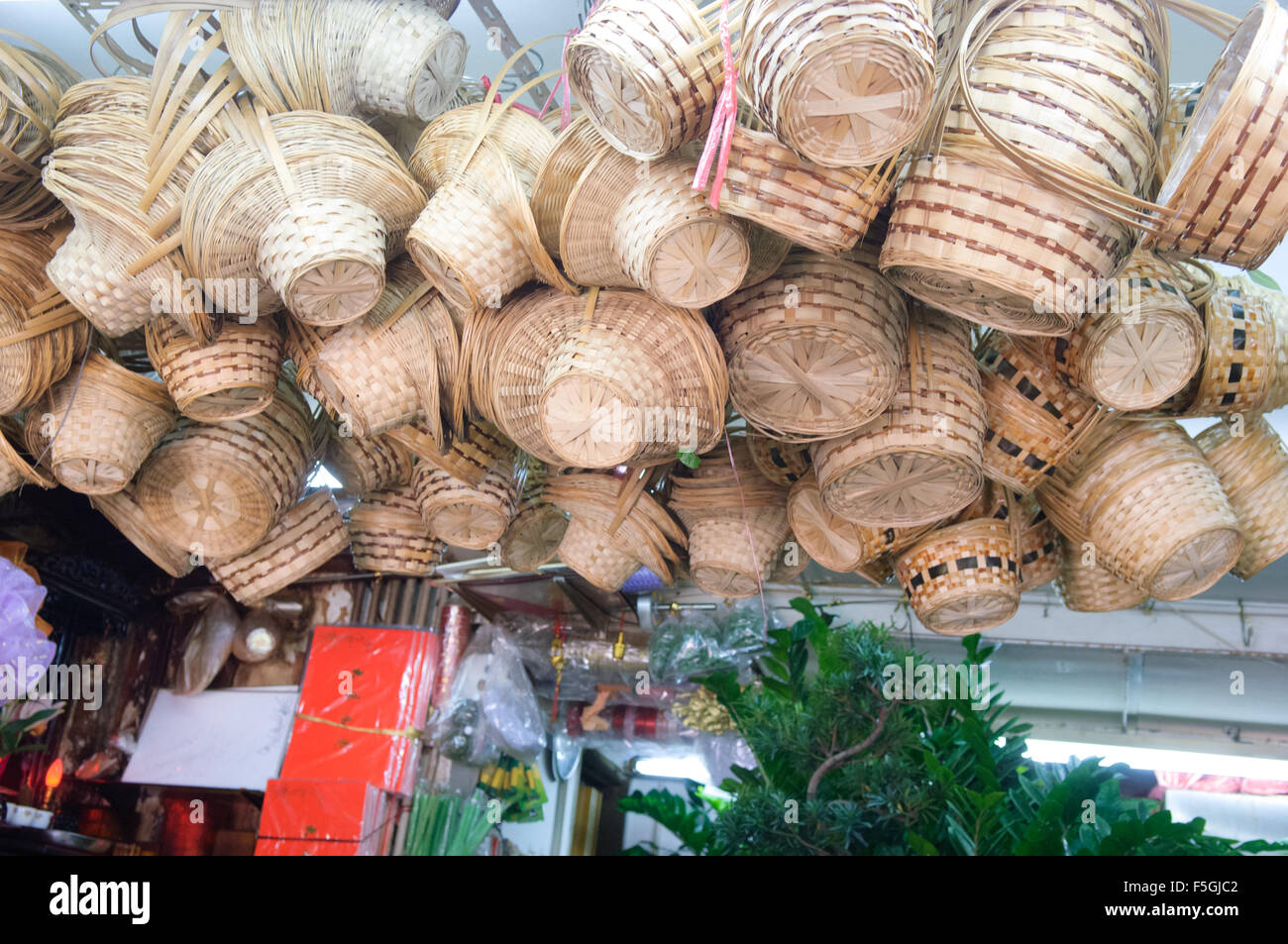 Baskets hanging in stall at the Flower Market, Mong Kok (Mongkok), Hong