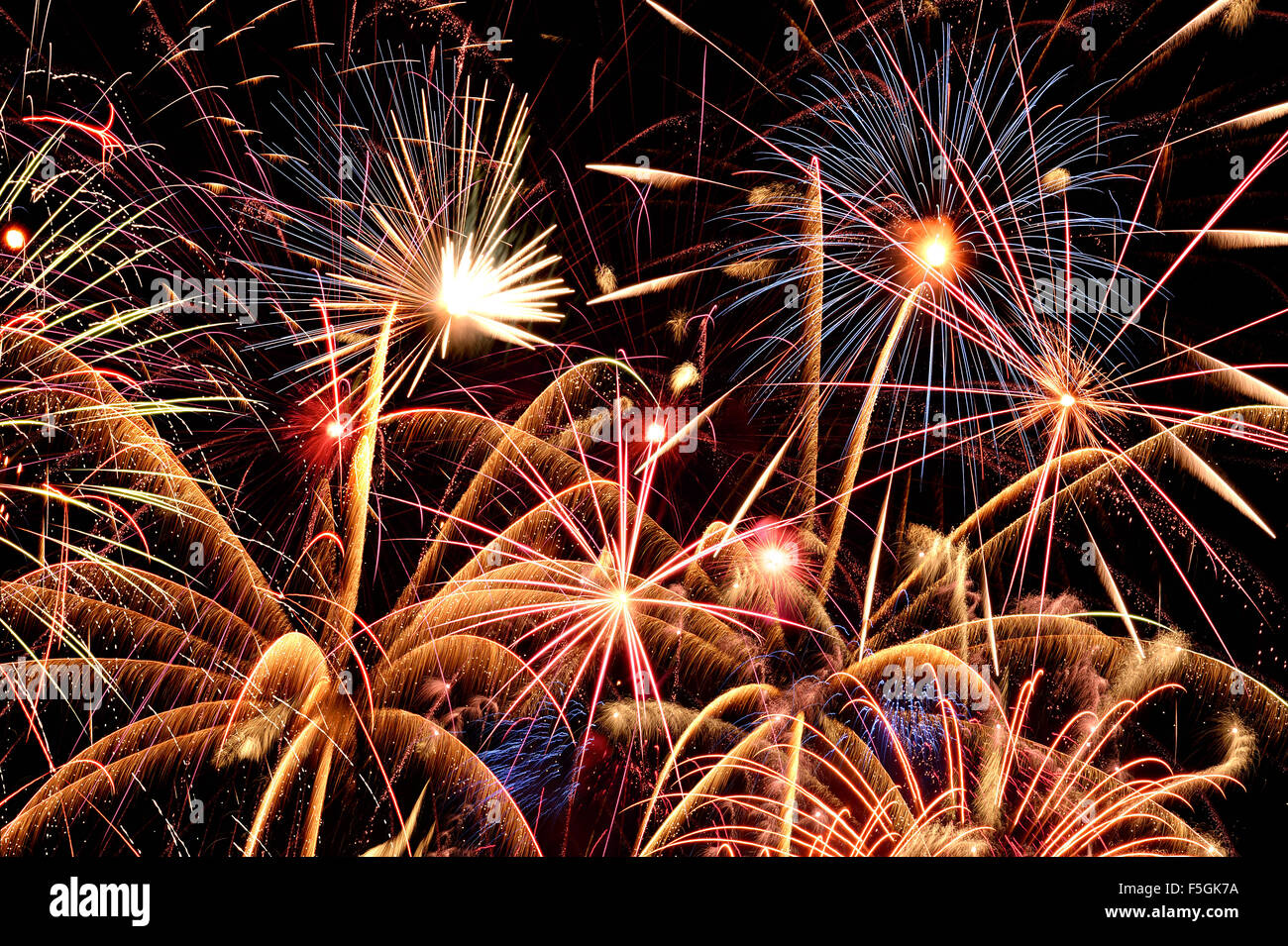 Close up view of fireworks against a dark sky Stock Photo