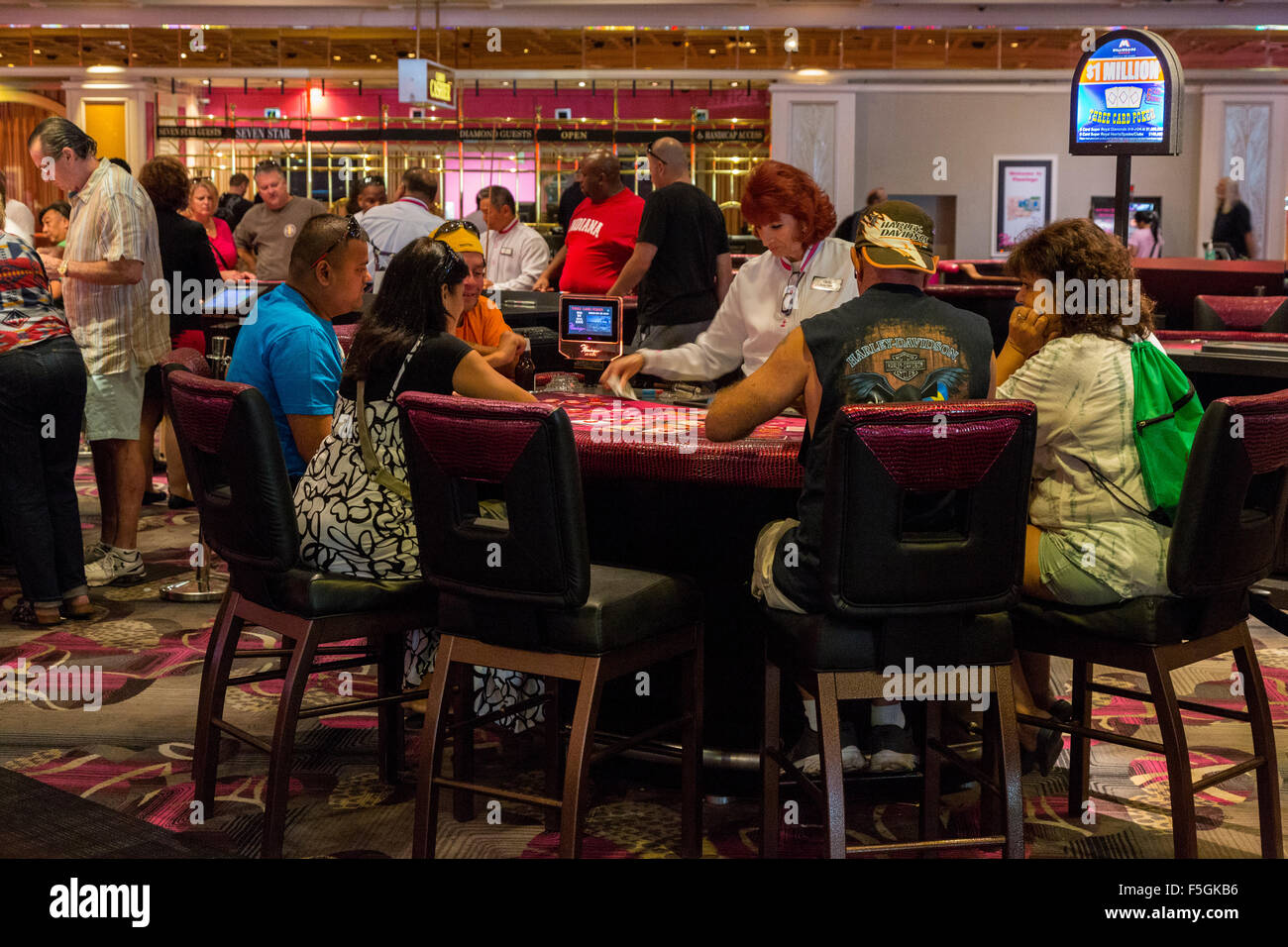 Las Vegas, Nevada. Flamingo Casino. Patrons at Gaming Tables Stock