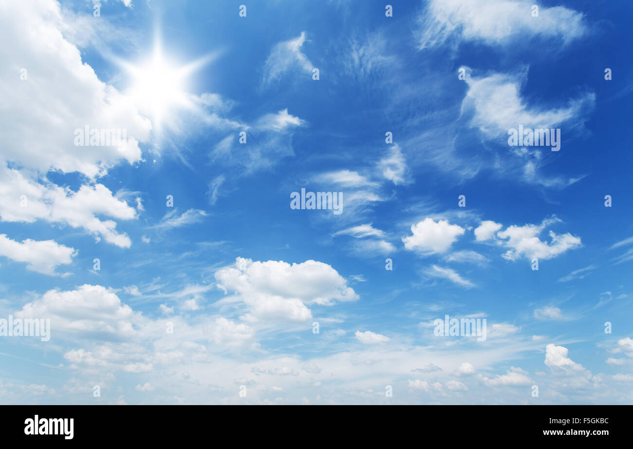 White heap clouds in the blue sky at the summer day. Stock Photo