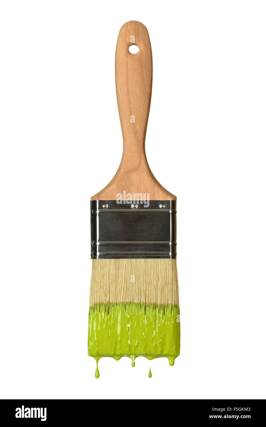 Paintbrush dripping green paint isolated over white background Stock Photo