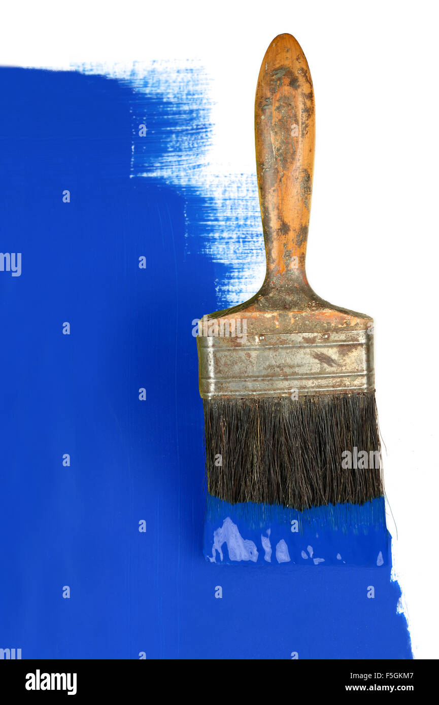 Vintage paintbrush with blue paint Stock Photo