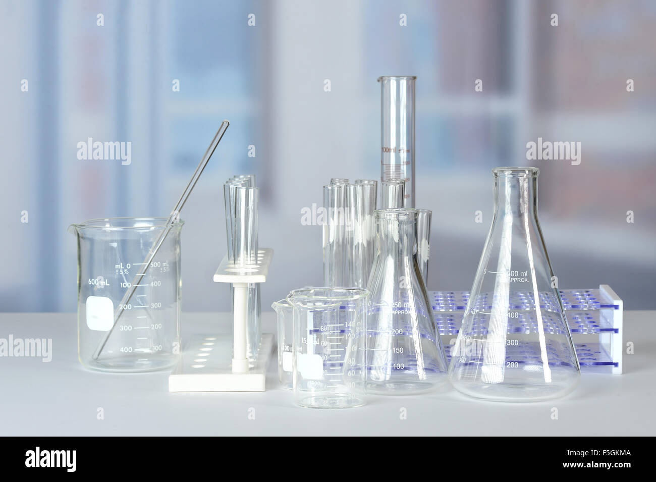 Laboratory glassware on lab table Stock Photo