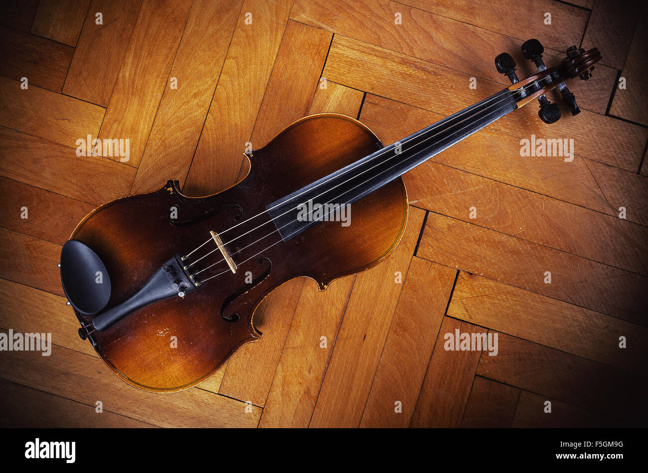 Old violin details, body part and neck. Stock Photo