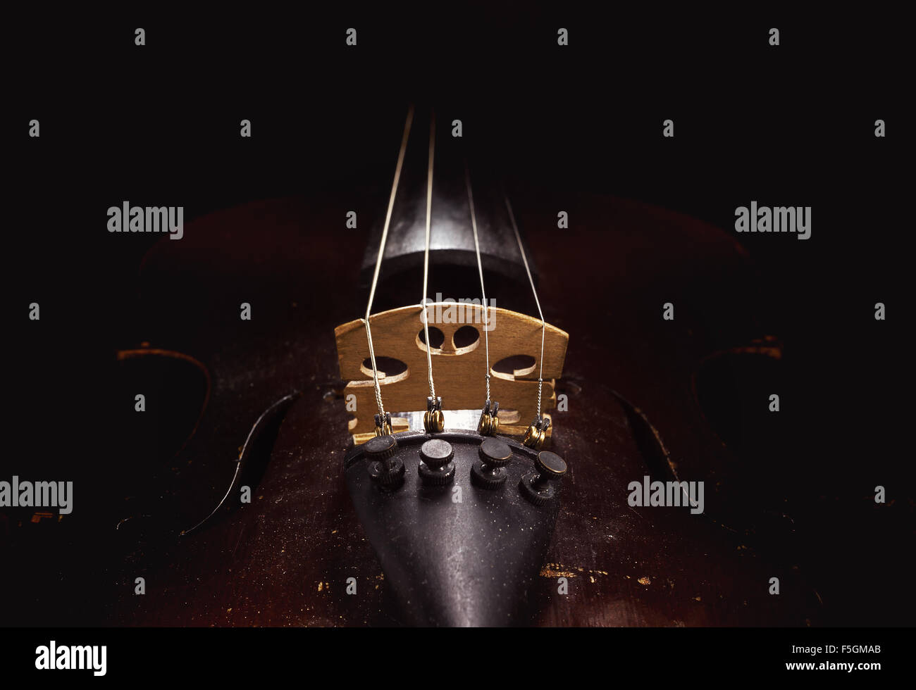 Old violin details, body part and neck. Stock Photo