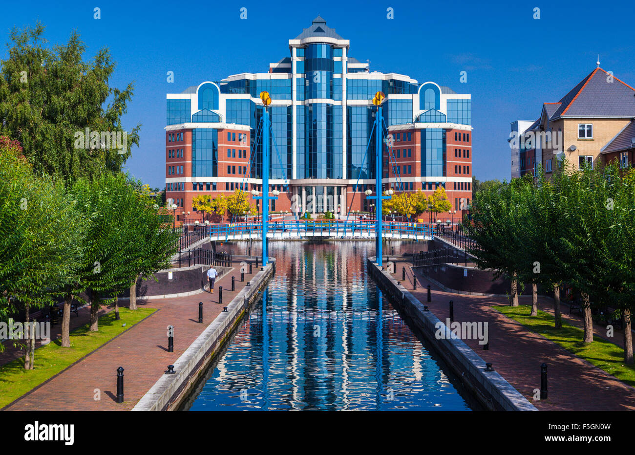 Quay West Building - Landscape. Salford Quays with reflections in the water. Stock Photo