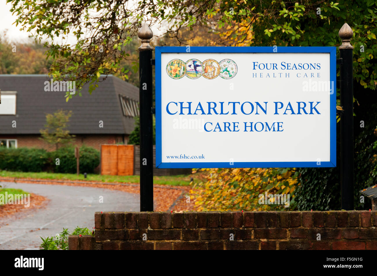Sign at the entrance to Charlton Park Care Home run by Four Seasons Health Care. Stock Photo