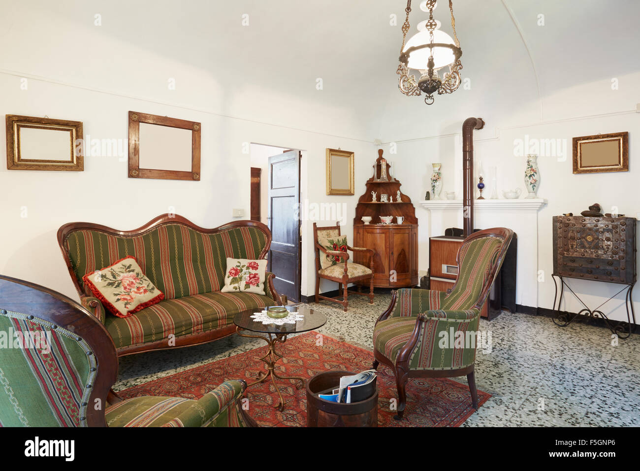 Living room with antiquities, Italian interior Stock Photo