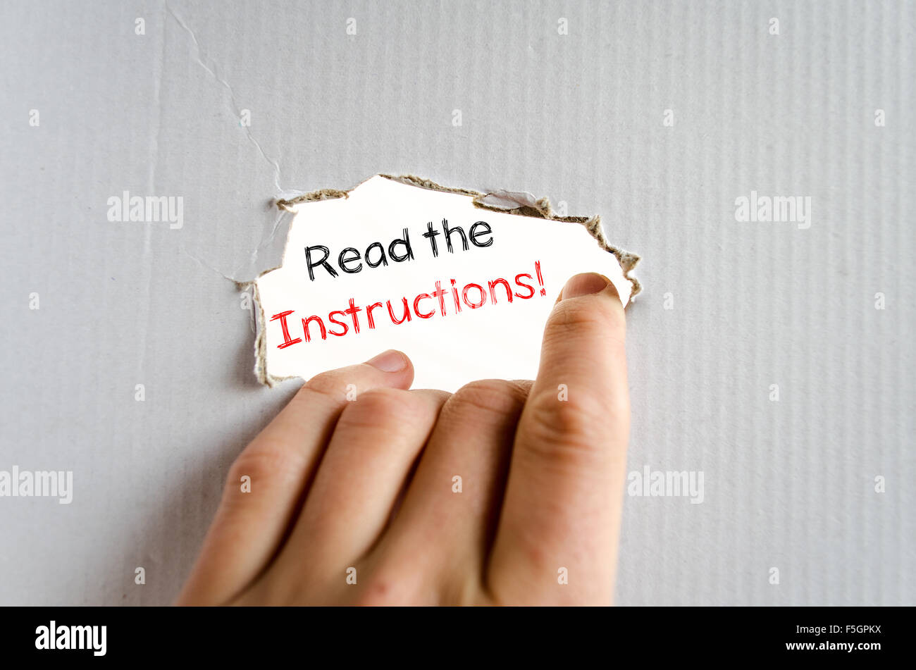 Read the instructions text concept isolated over white background Stock Photo