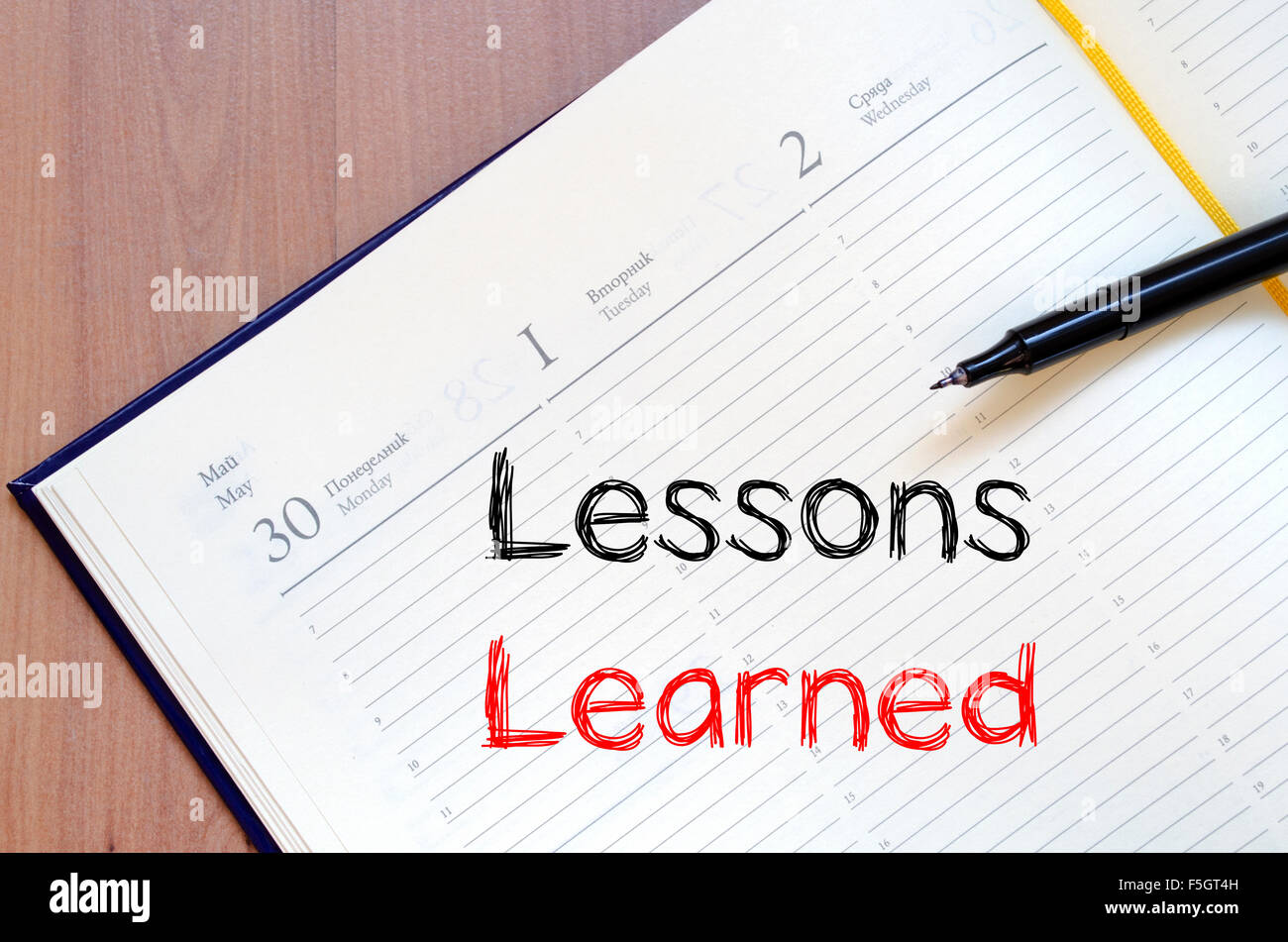 Lessons learned text concept write on notebook Stock Photo - Alamy