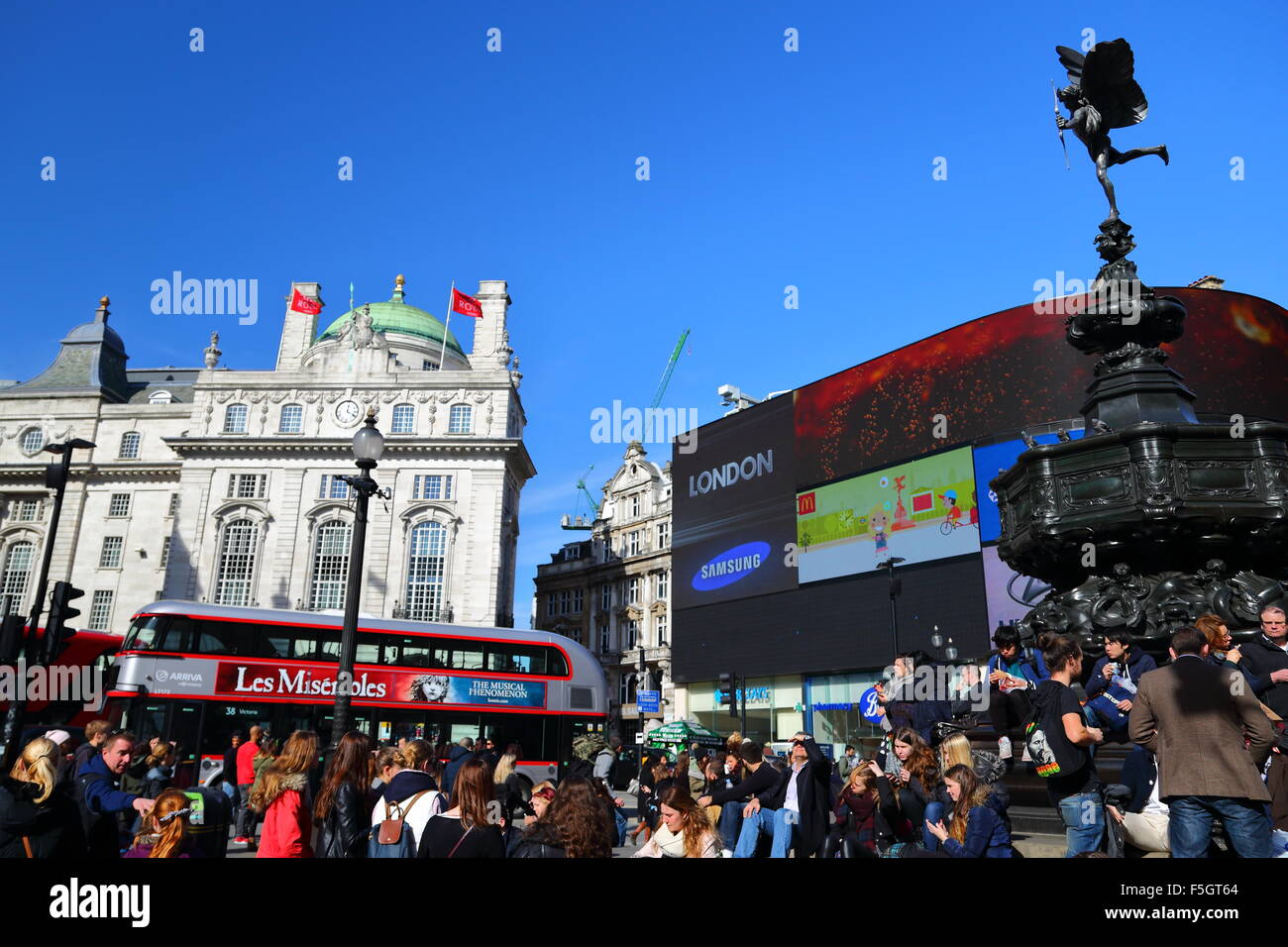 Tourists at London Piccadilly Circus in Summer Stock Photo
