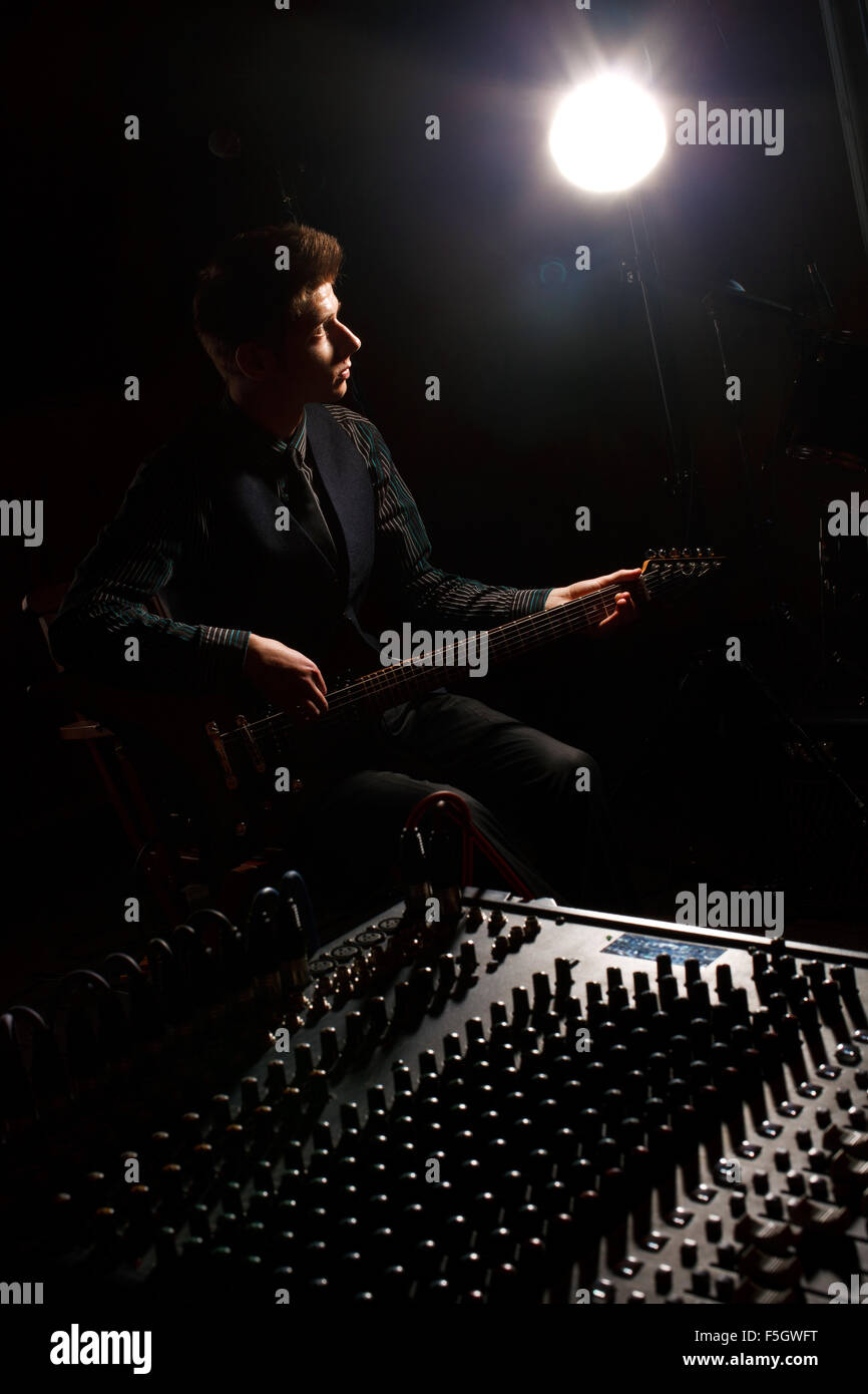 guitarist recording and playing guitar Stock Photo - Alamy