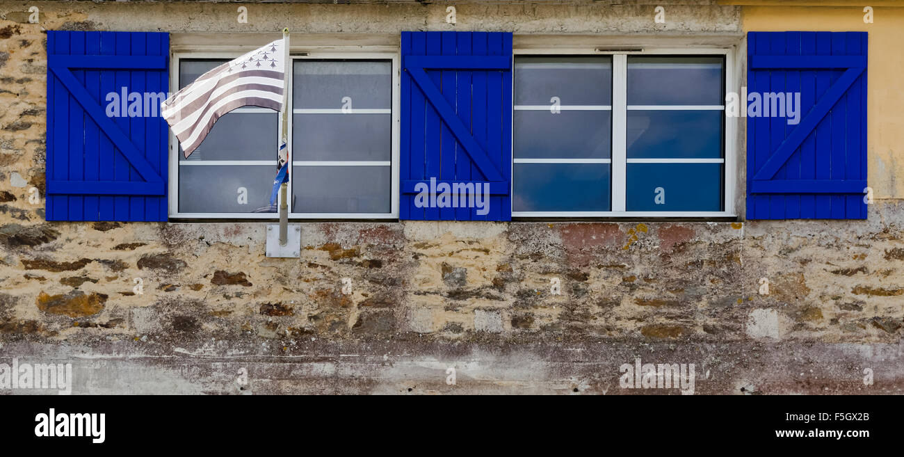 Blue shuttered windows hi-res stock photography and images - Alamy