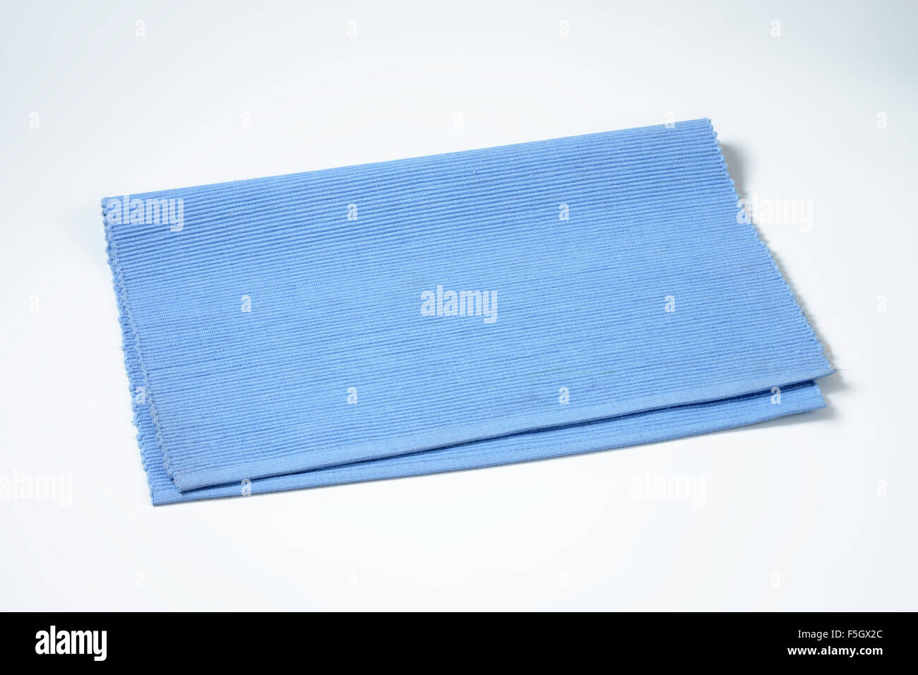 blue place mat on white background Stock Photo