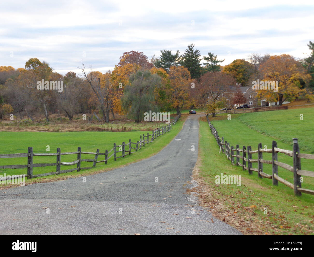 Old wooden fence along a roadway between the lane and pasture Stock ...