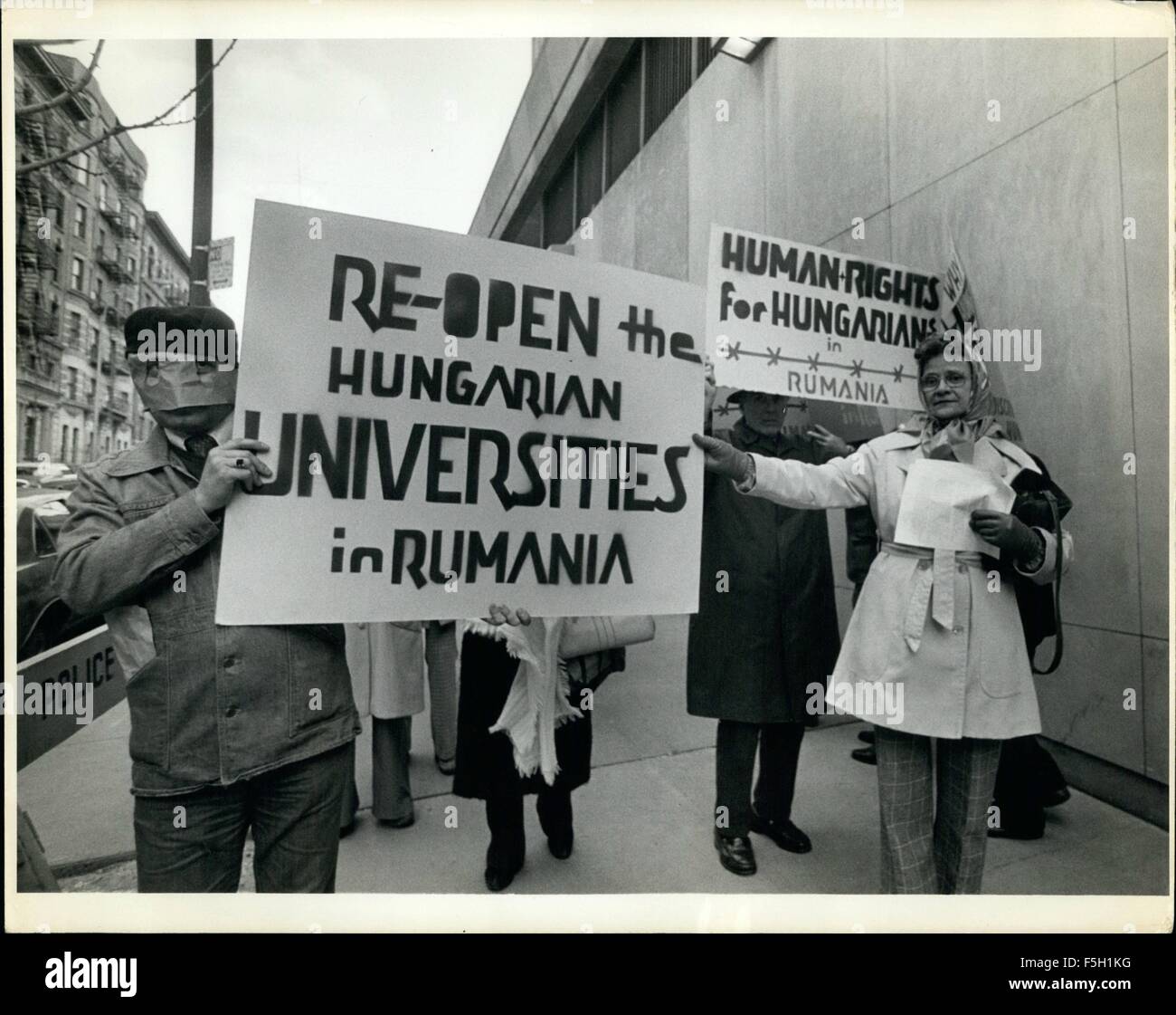 1977 - Human Rights demonstration at Columbia Univ. Several hundreds American of Hungarian origin demonstrated against the brutal oppression of 3, 5 million minority inhabitants of Rumania. The Committee for Human Rights in Rumania fights against systematic discrimination in all fields of cultural and economic life, also against straight historic lies by Communist functionaries disguised as a scholarly delegations. 3/31/77 Man in mask wants to protect relatives in Transylvania from retaliation. © Keystone Pictures USA/ZUMAPRESS.com/Alamy Live News Stock Photo