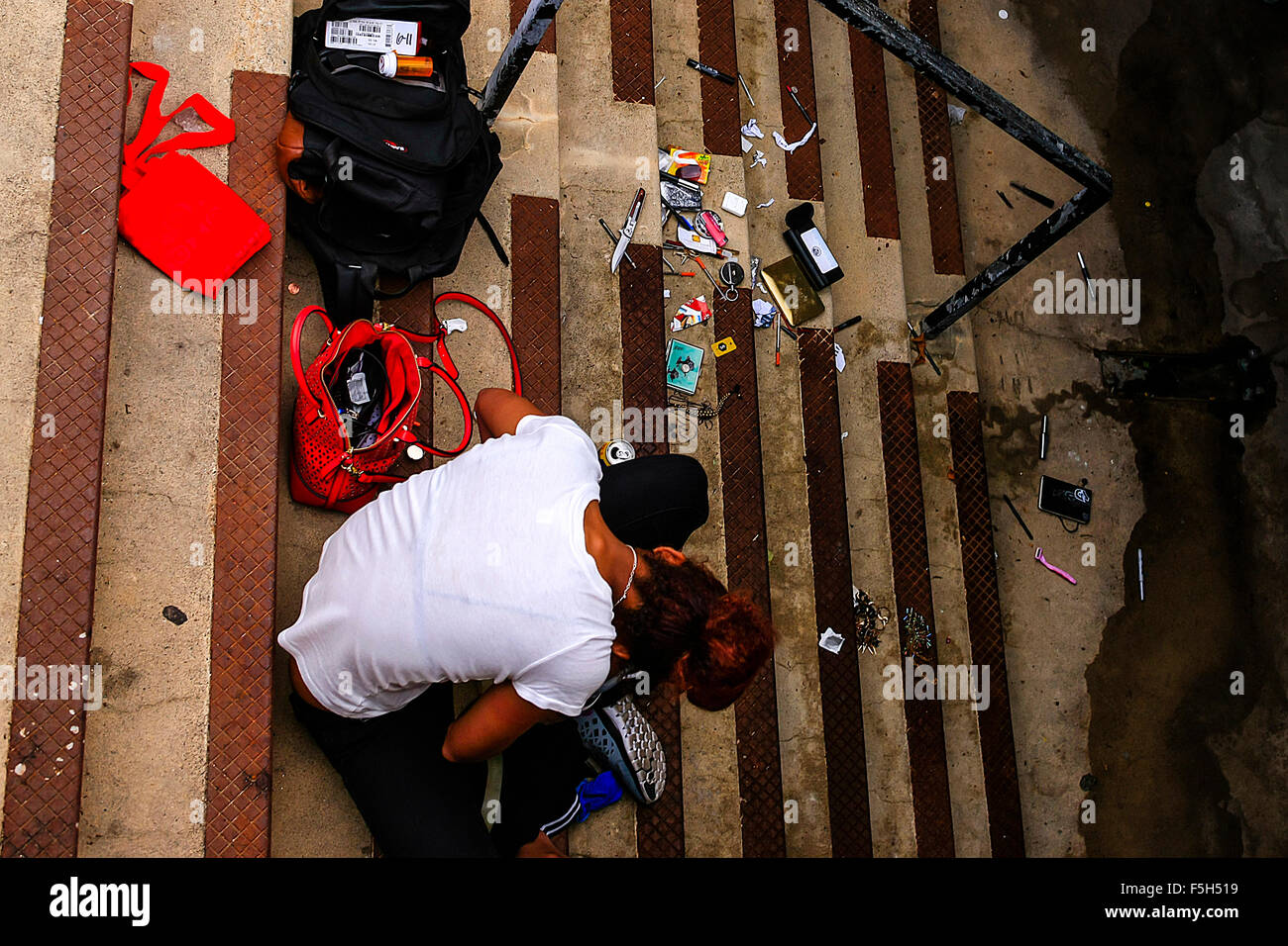 Drug addicts surrounded by syringes, shoot up in an abandoned subway opposite City Hall in San Francisco Stock Photo