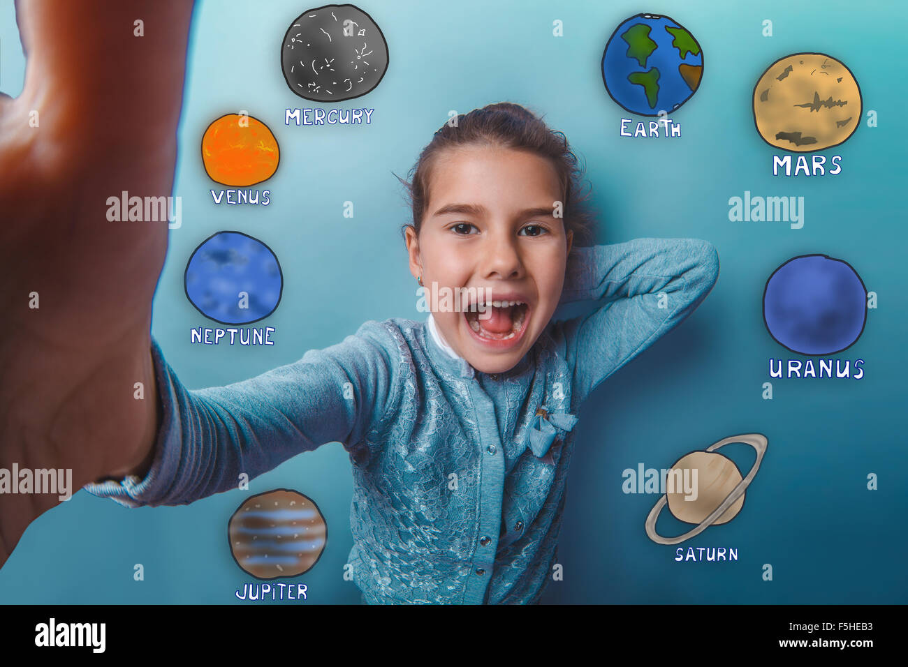 girl is photographed close-up of a happy laughing planets of the Stock Photo