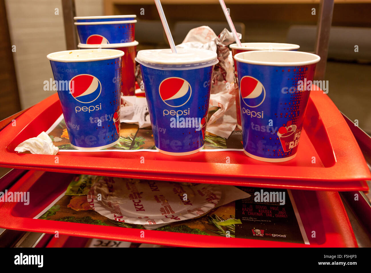 Leftover food on a tray, Pepsi cups, KFC waste, Czech Republic Stock Photo