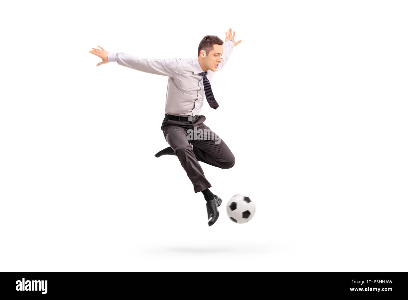 Kicking football in the air hires stock photography and images Alamy