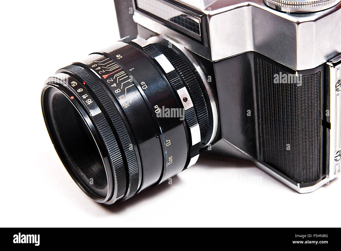 Range finder camera with lens. Close up view part of old retro photo camera. Classic black manual film camera isolated on white Stock Photo