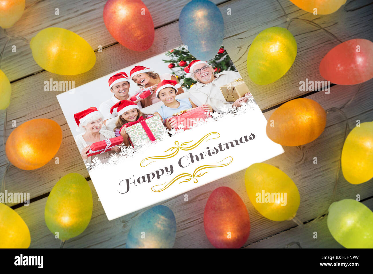 Composite image of christmas lights on table Stock Photo