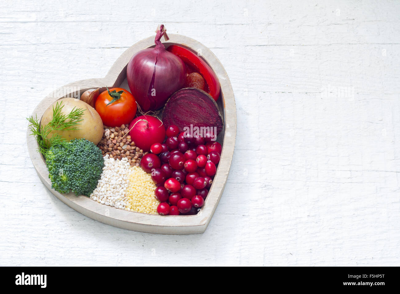 Healthy food in heart and lowering pressure sign concept Stock Photo