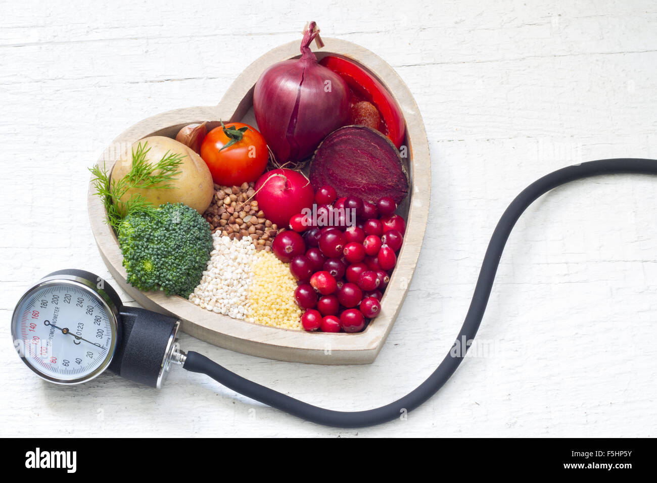 Healthy food in heart and lowering pressure sign concept Stock Photo