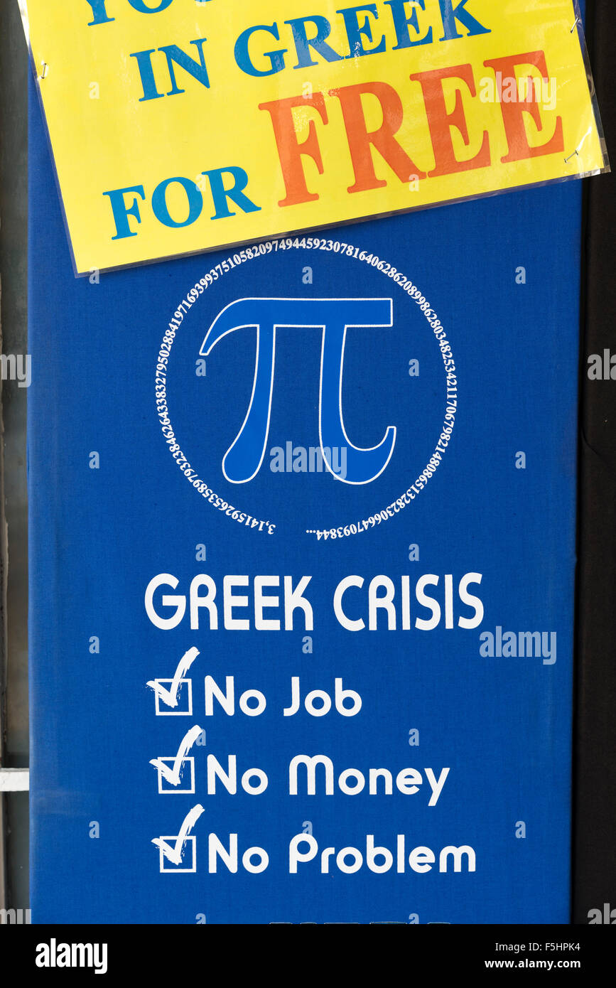 ATHENS, GREECE - OCTOBER 27, 2015: Greek crisis, poster on the door of a shop in the Plaka district Stock Photo