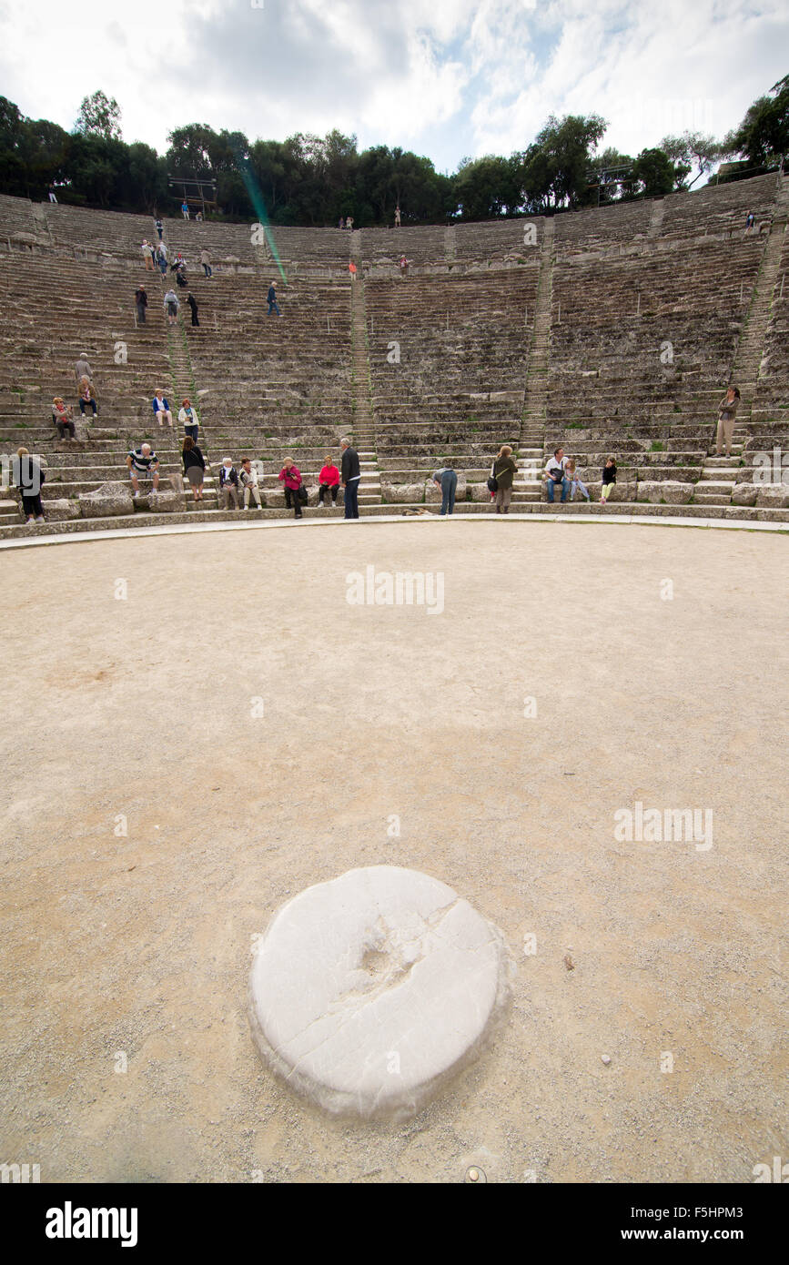 EPIDAURUS, GREECE - OCTOBER 28, 2015: Tourists in the amphitheater of Epidaurus Stock Photo