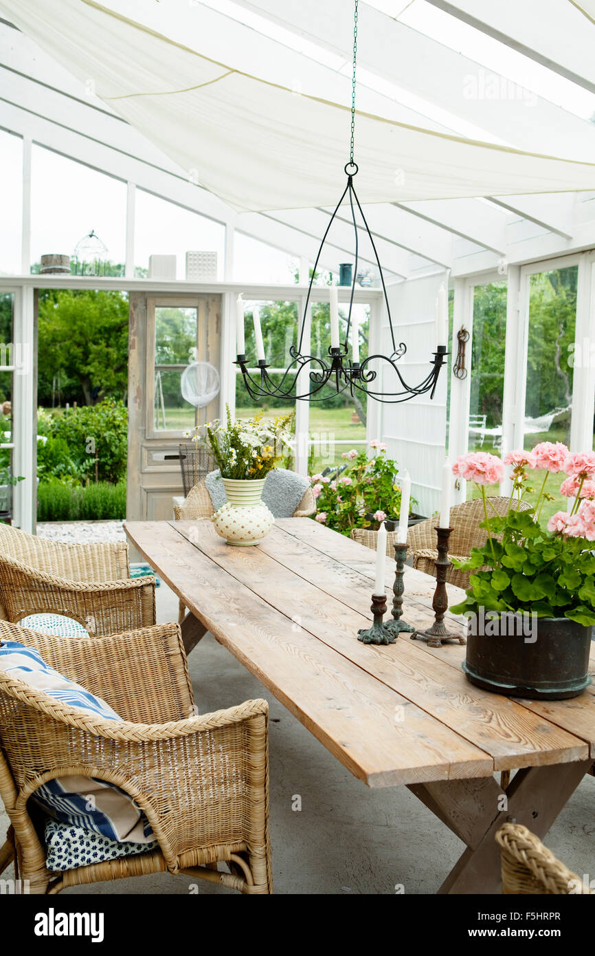 Sweden Gotland Bursvik Burgegard Wooden Table And Chairs In Patio Stock Photo Alamy