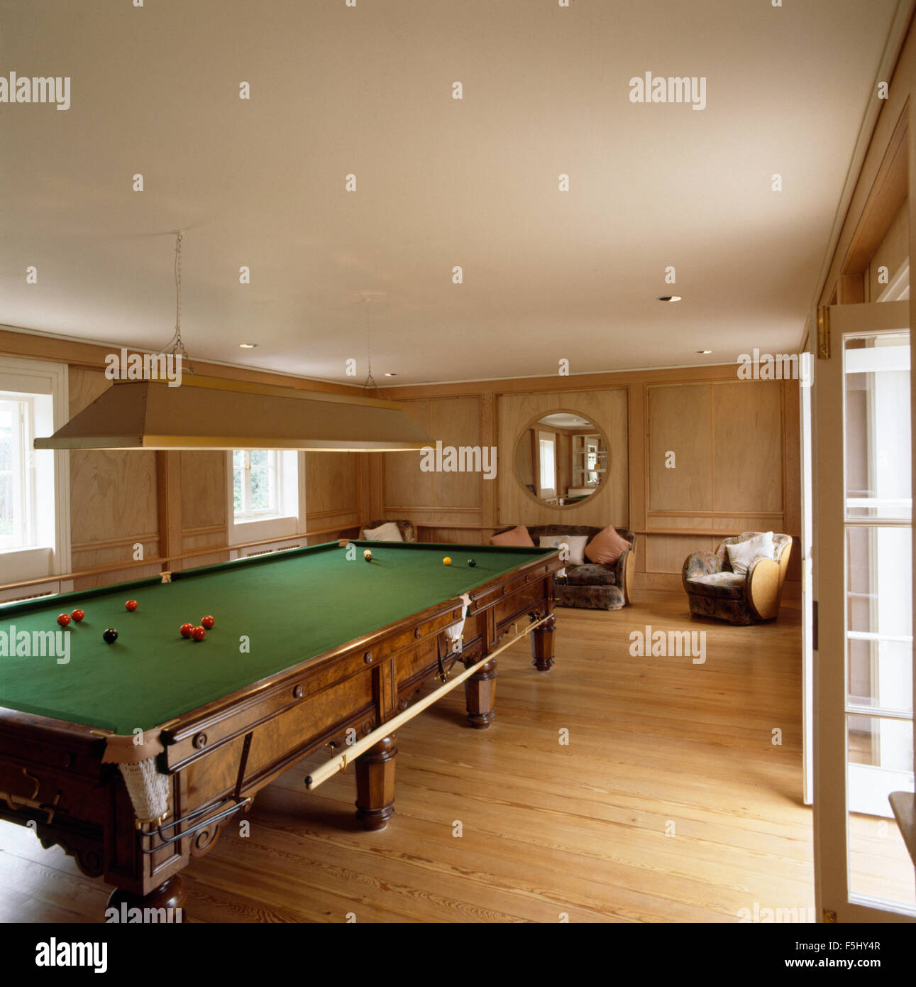 Pool table in thirties style games room Stock Photo