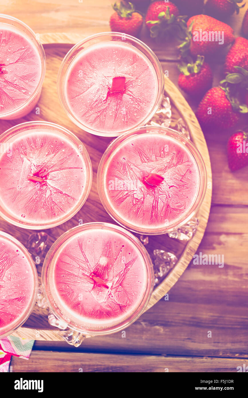 Homemade strawberry popsicles made in plastic cups Stock Photo Alamy