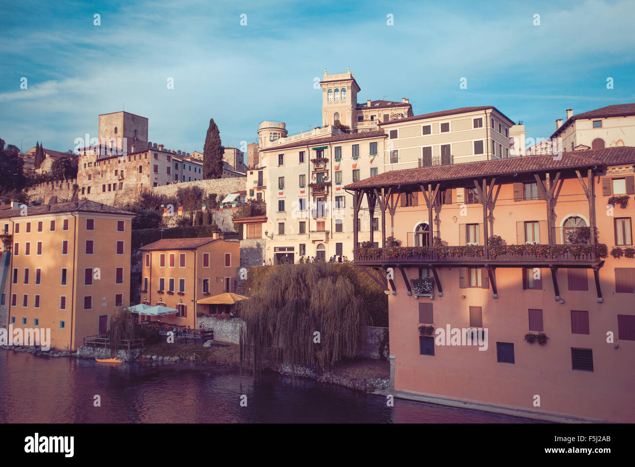 Italian city Bassano del Grappa near river Brenta, toned photo Stock