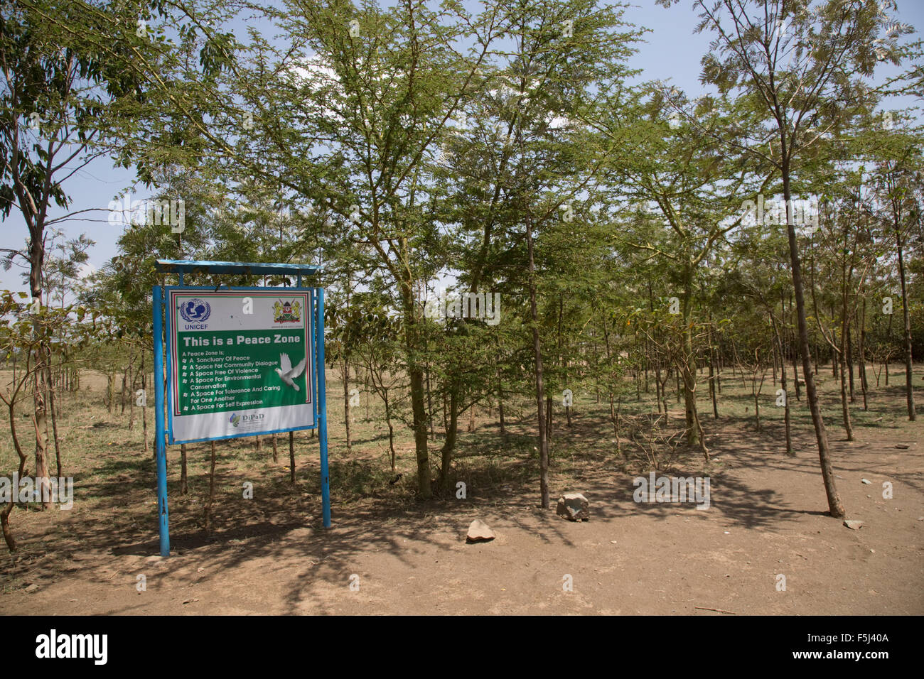 Signboard displaying Peace Zone of trees planted in African school