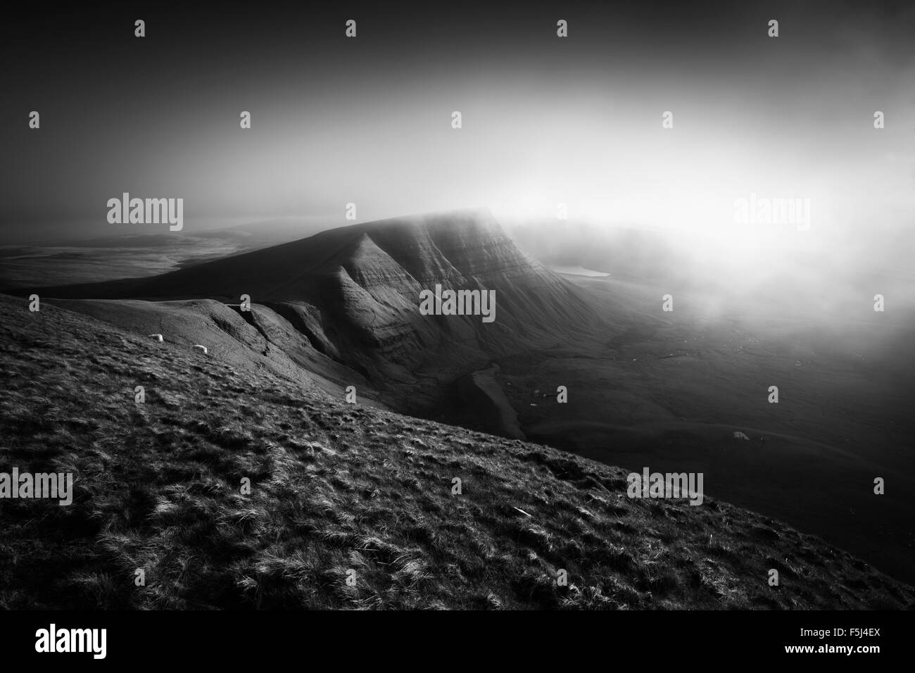 Mist rolling in over Picws Du. The Black Mountain. Brecon Beacons National Park. Carmarthenshire. Wales. UK. Stock Photo