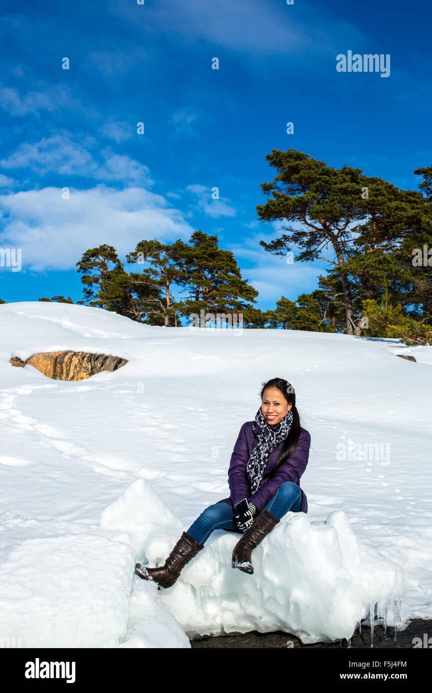 Female outdoor exercise in cold weather in winter Stock Photo