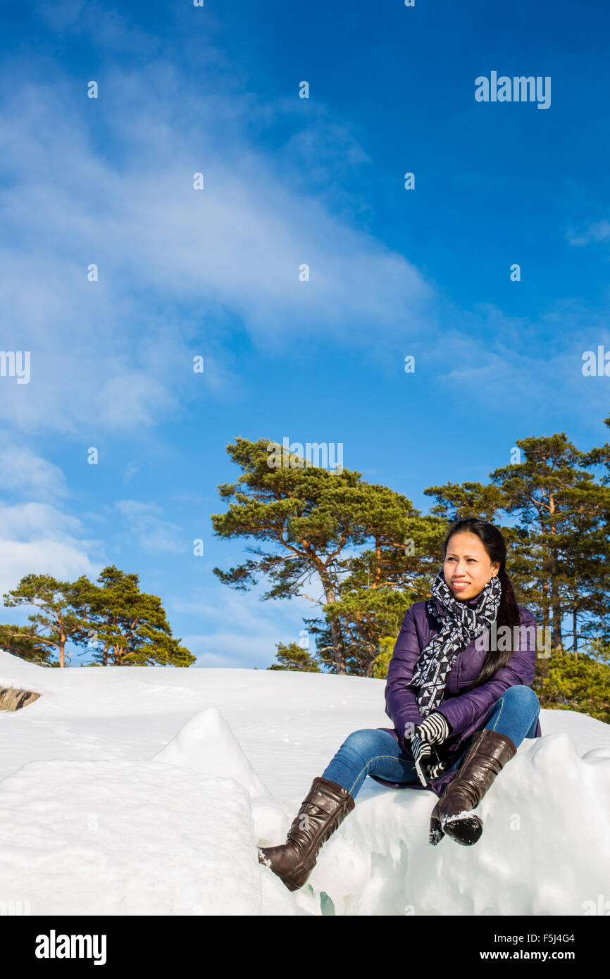 Female outdoor exercise in cold weather in winter Stock Photo