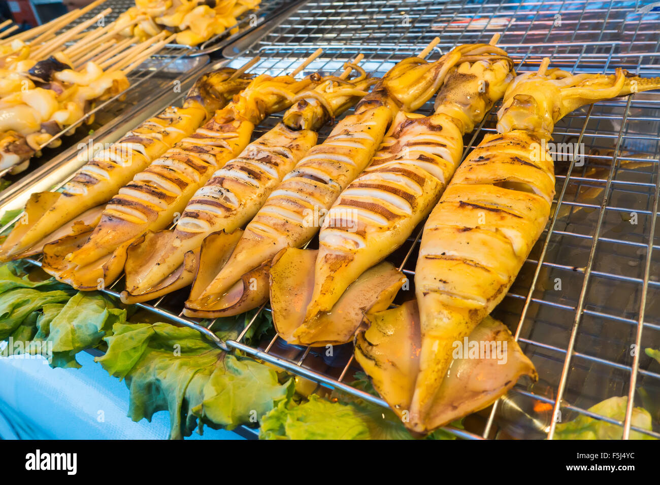 Many of grilled squid in a restaurant Stock Photo - Alamy