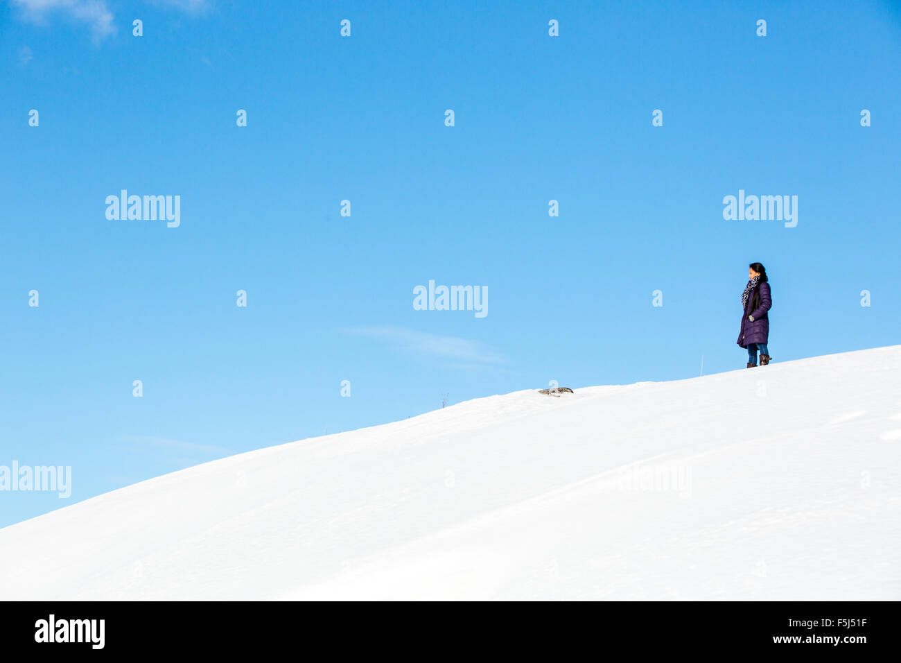 Female outdoor exercise in cold weather in winter Stock Photo