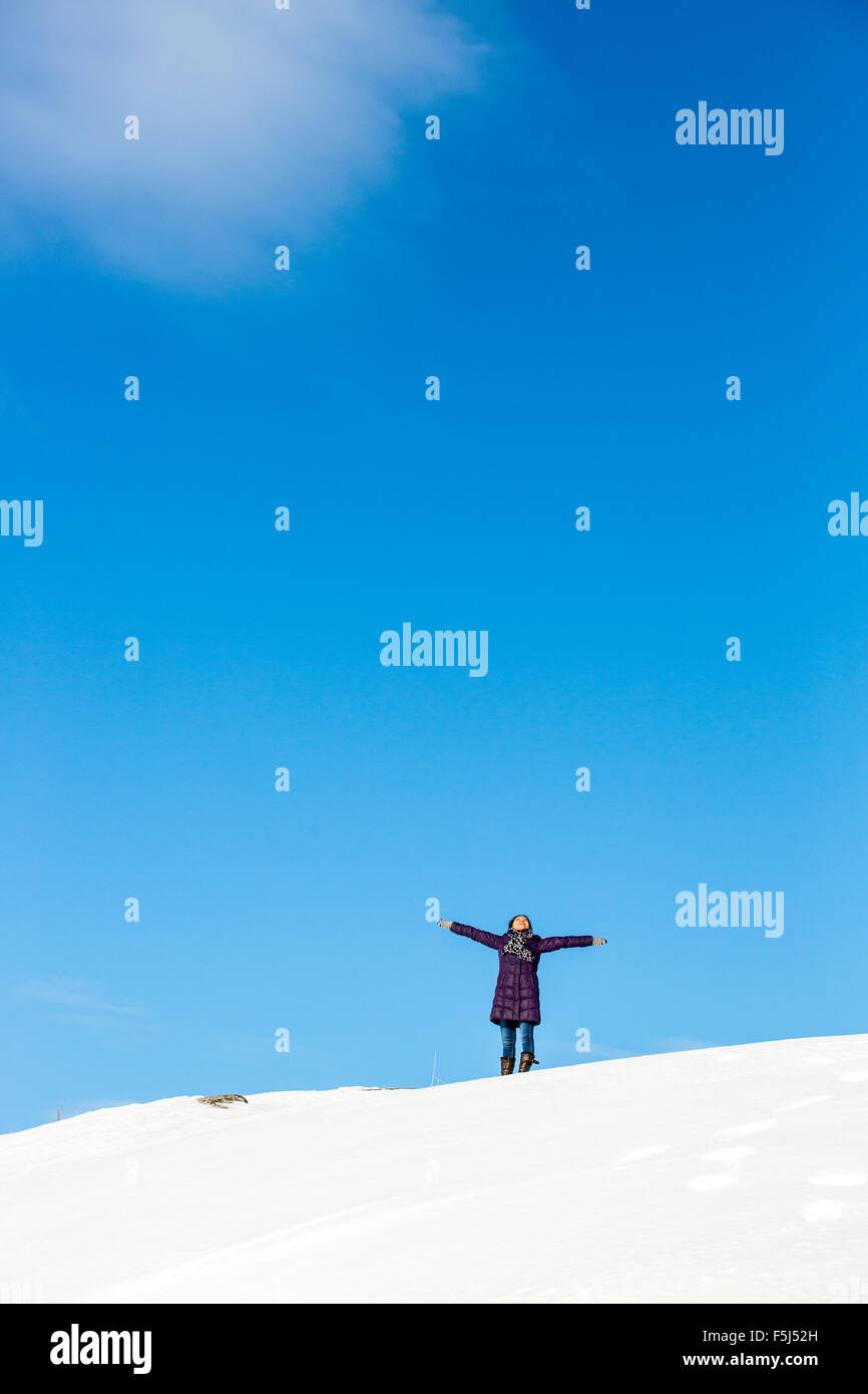 Female outdoor exercise in cold weather in winter Stock Photo