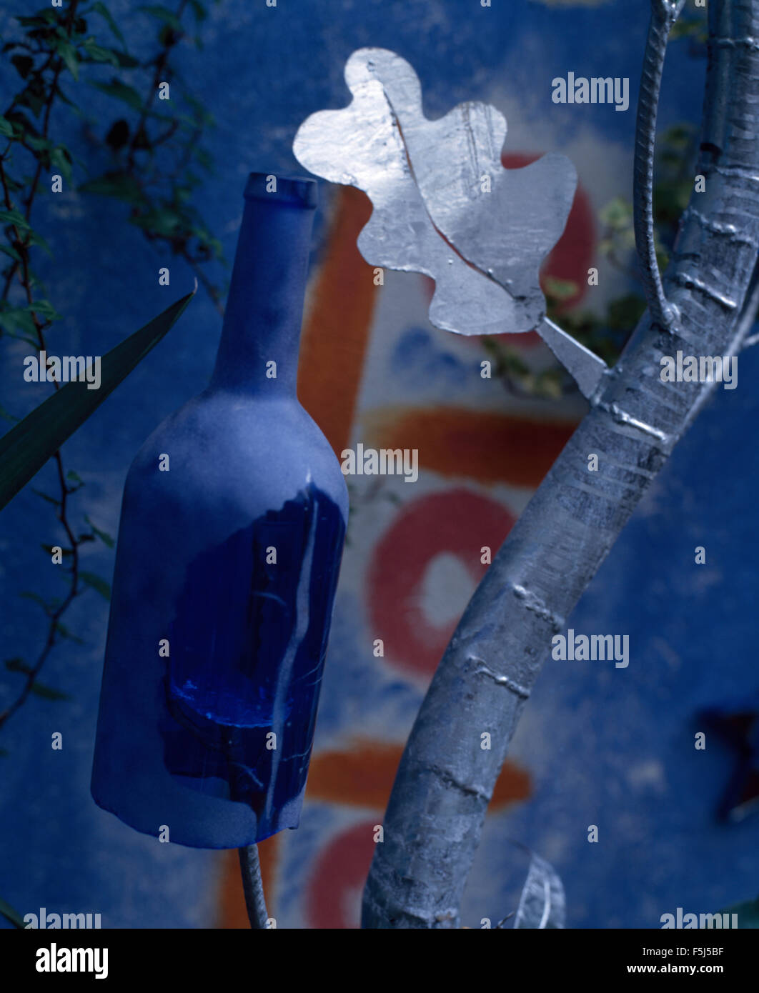 Close-up of a blue painted glass bottle Stock Photo